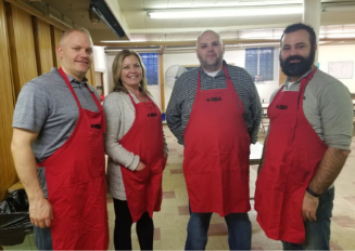 Photo of RBA employees volunteering at Loaves and Fishes