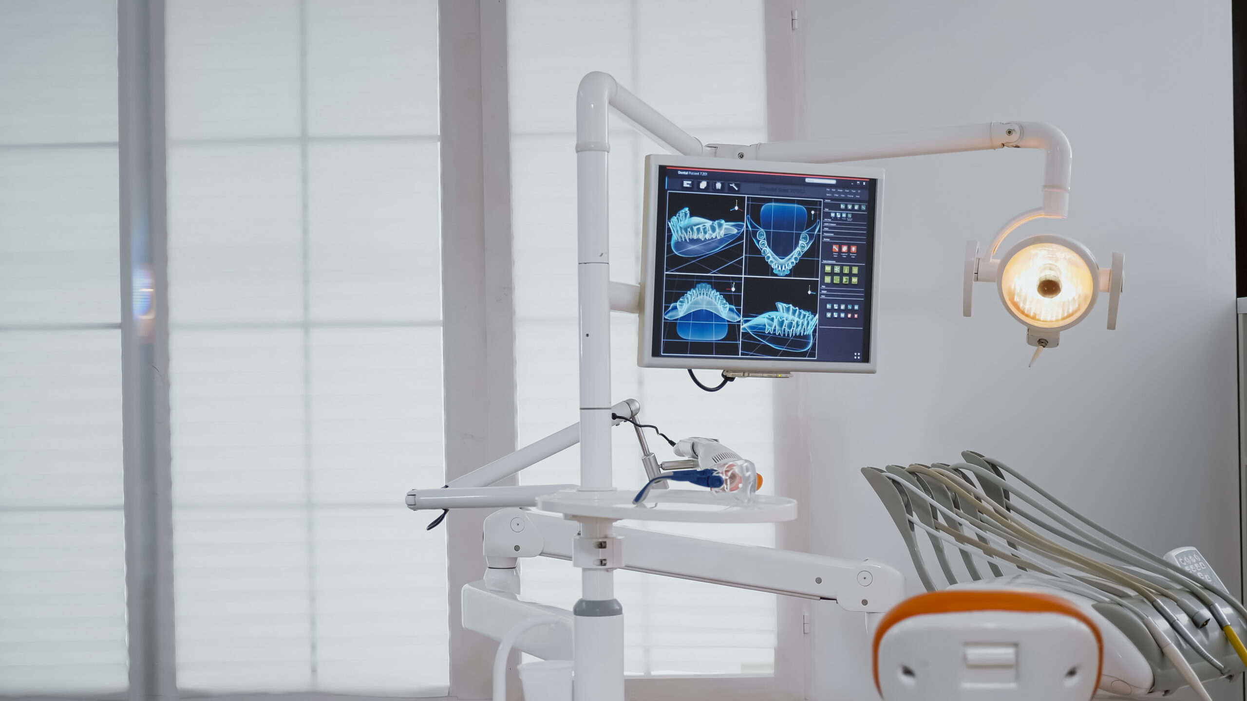 Close up of medical orthodontist display with teeth x ray images on it